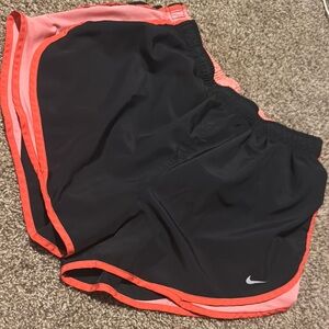 Nike Tempo Dri-Fit shorts (womens’ L) - EUC! Black w/peach mesh & orange trim.
